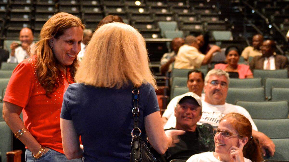 Fortuna Smukler, volunteer, left, observing the announcement of North Miami Beach election results on Tuesday, May 7, 2013.