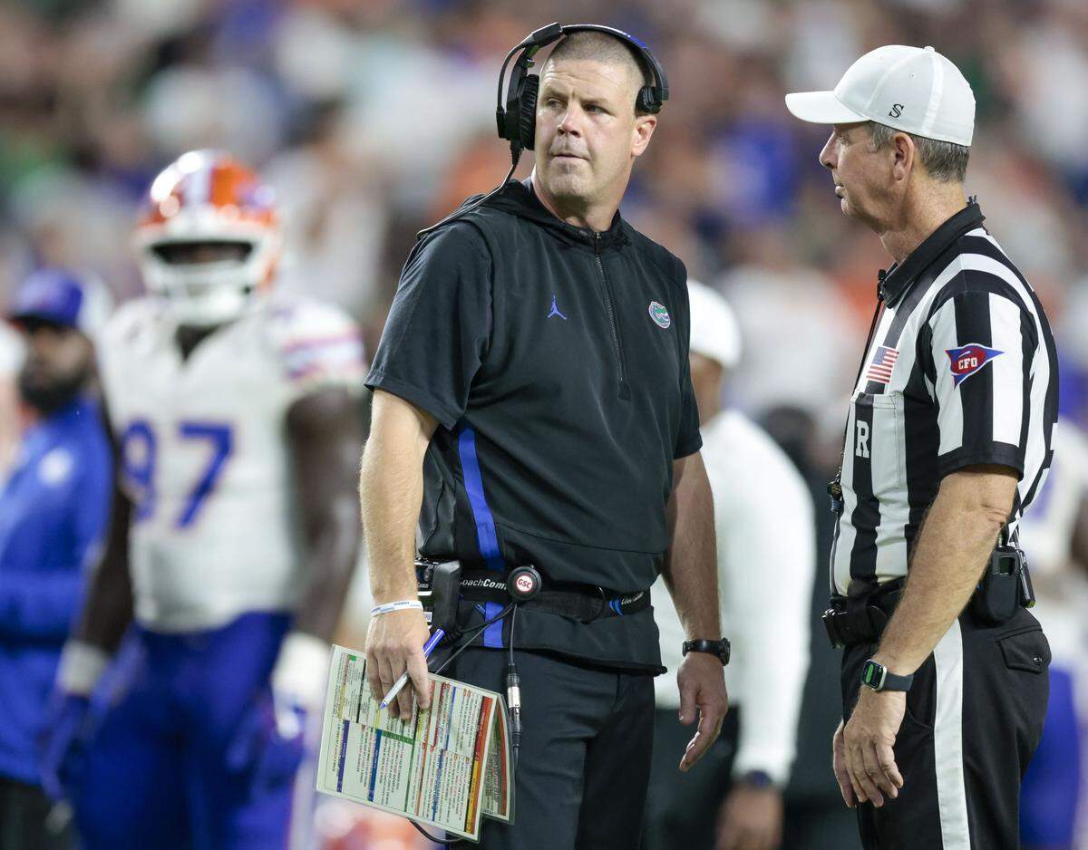 Florida Gators head coach Billy Napier on the field during the game against the Miami Hurricanes.