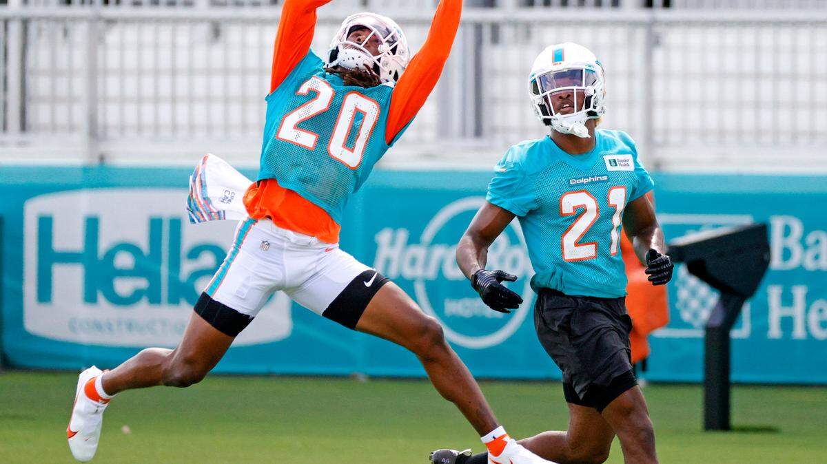 Miami Dolphins safety Sheldrick Redwine (20) and Dolphins free safety Eric Rowe (21) does drills during practice at Baptist Health Training Complex in Hard Rock Stadium on Wednesday, October 20, 2021 in Miami Gardens, Florida, in preparation for their game against the Buffalo Bills at Highmark Stadium on Sunday, October 31.