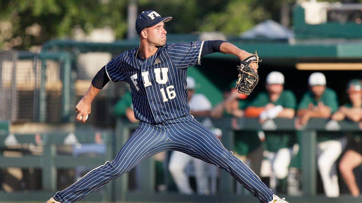 FIU Panthers starting pitcher Christian Santana delivers against UM Hurricanes during the baseball game on Wednesday, April 6, 2022 at Alex Rodriguez Park at Mark Light Field in Coral Gables. Andrew Uloza / for THE MIAMI HERALD