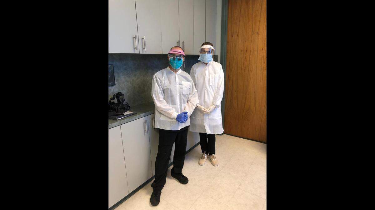Drs. Margo Brilliant and Jeff Rothenberg said they and their staff members are wearing personal protective equipment during the COVID-19 pandemic, including N95 respirators, protective face shields, gloves and disposable gowns.