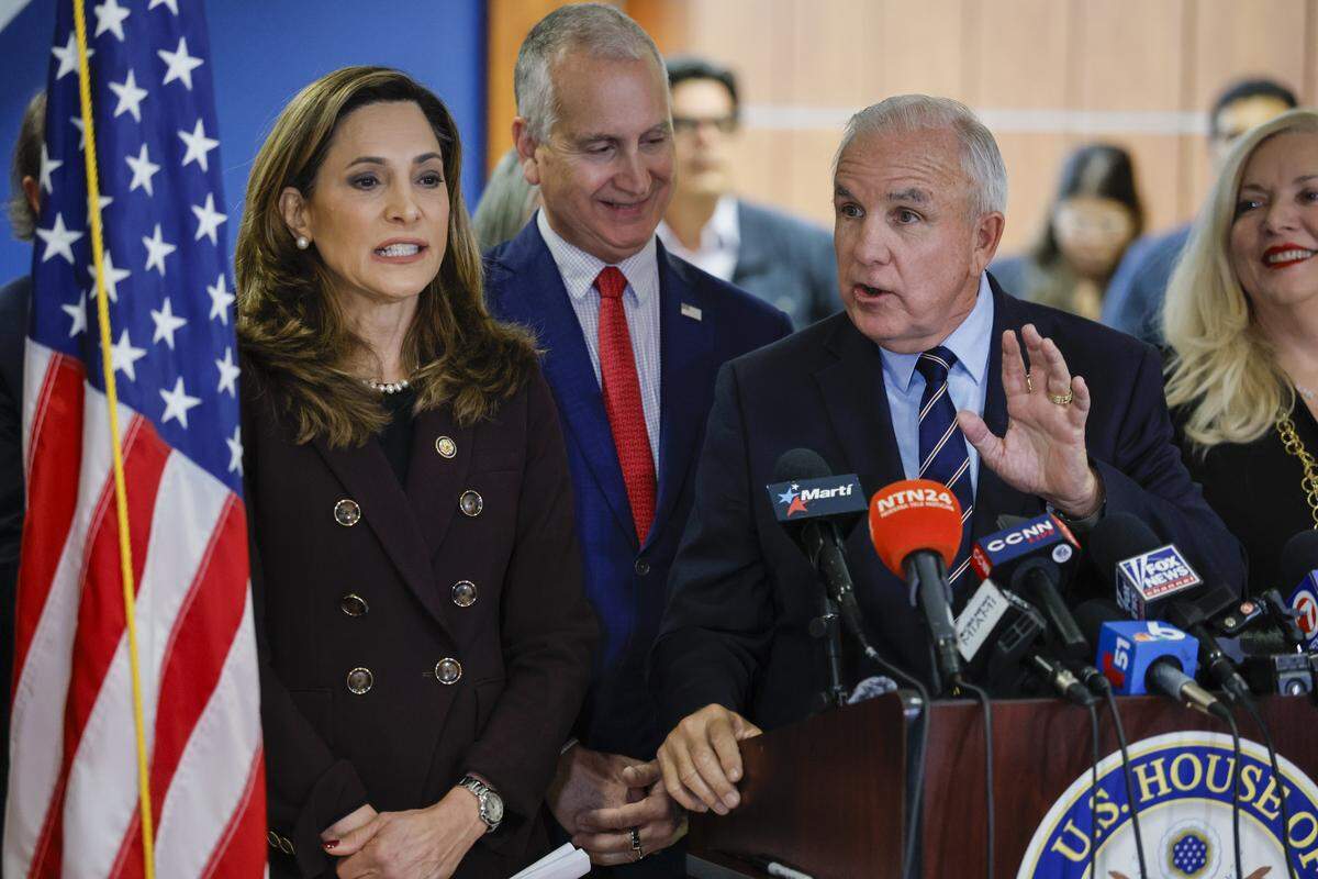 United States Representative Carlos Gimenez speaks during a joint press conference with Rep. Maria Elvira Salazar and Rep. Mario Diaz-Balart, in Doral, Florida, as they discuss the U.S. attack on Venezuela and the capture of Venezuelan leader Nicolás Maduro on Saturday, January 3, 2026. 