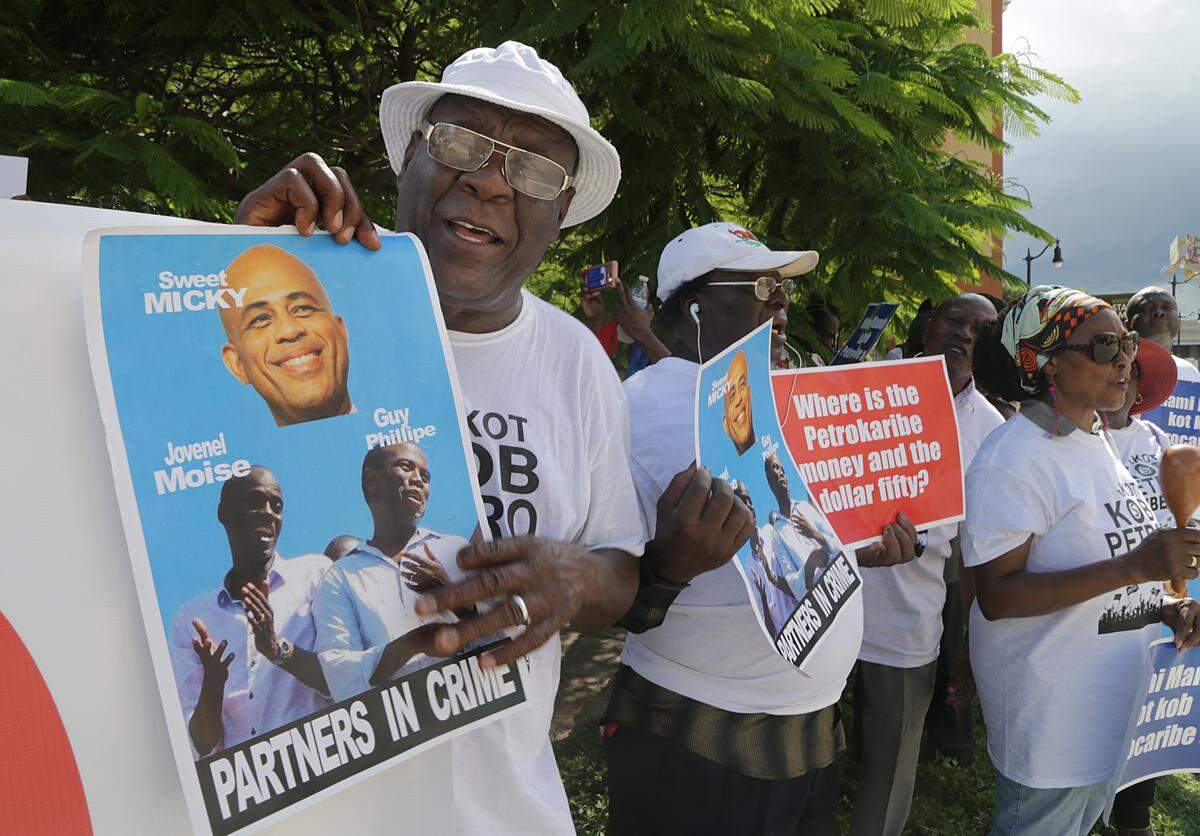 Felix Joseph was among a group of members of the South Florida Haitian community who demonstrated in front of the Haitian consulate in Miami on Saturday, Sept. 15, 2018. He and others are accusing past and present government officials of wasting billions in the fund from Venezuela’s discounted PetroCaribe oil program that Haiti is included in. Their mantra is ‘Kot Kob PetroCaribe?” “Where is the PetroCaribe money?” Similar protests have taken place in Haiti, Montreal, Canada and New York.