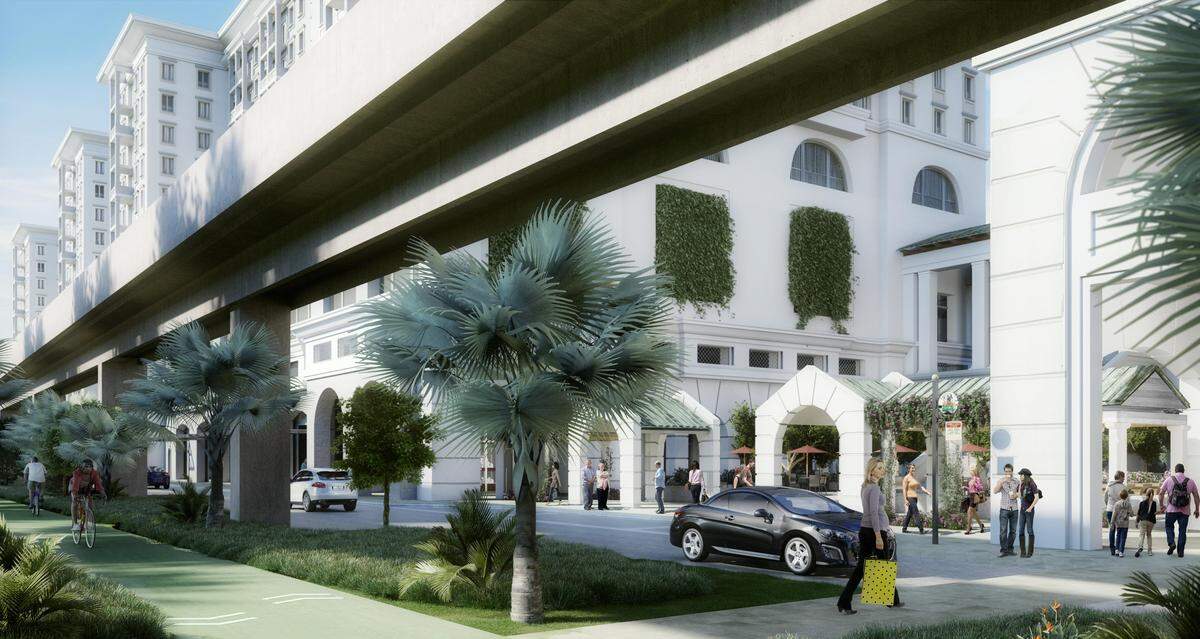 A rendering of the Gables Station mixed-use project, now under construction along South Dixie Highway, includes a conceptual image showing, at left foreground, how a portion of the Underline trail and park could look. NP International will pay $3 million to build a quarter-mile trail segment which is now under design and will include Coral Gables’ first dog park.