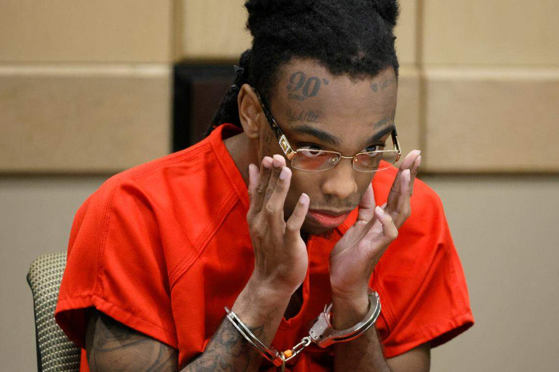 Jamell Demons, better known as rapper YNW Melly, adjusts his glasses during a hearing in his trial at the Broward County Courthouse in Fort Lauderdale on Friday, Oct. 6, 2023. (Amy Beth Bennett / South Florida Sun Sentinel)