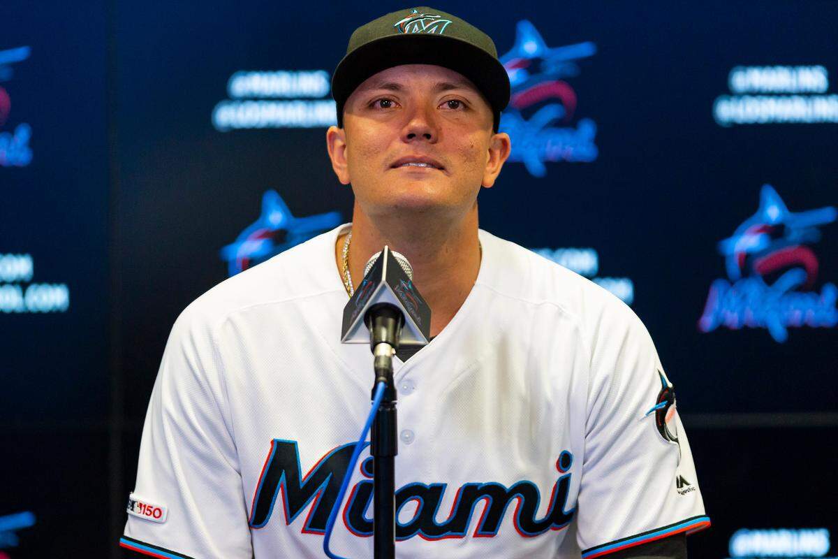 Miami Marlins shortstop Miguel Rojas (19) holds back tears during a press conference at Marlins Park in Little Havana on Friday, September 20, 2019. The Miami Marlins announced they resigned Don Mattingly and Miguel Rojas to a two-year contract extension with the team.