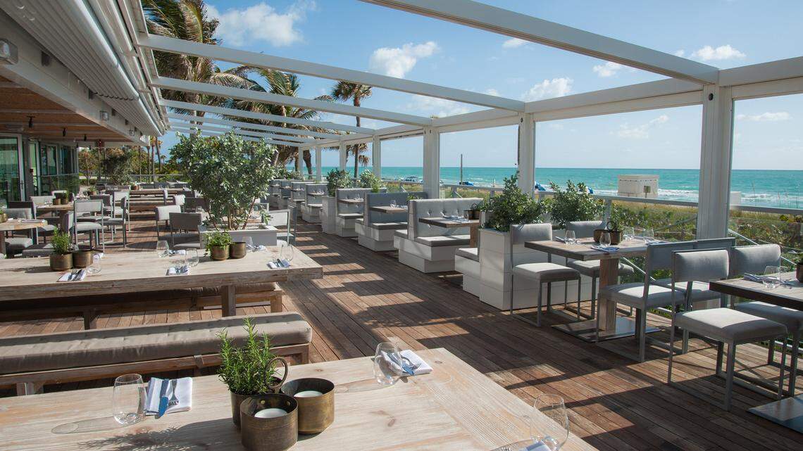 The outdoor patio at Ocean Social at the Eden Roc Miami Beach offers terrific views of the Atlantic.