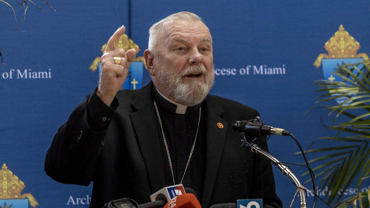 Archbishop Thomas Wenski speaks during an April 16 press conference held by the Archdiocese of Miami, to address the cancellation of an $11 million federal contract with Catholic Charities. The contract supported shelter and care for unaccompanied migrant children entering the U.S.