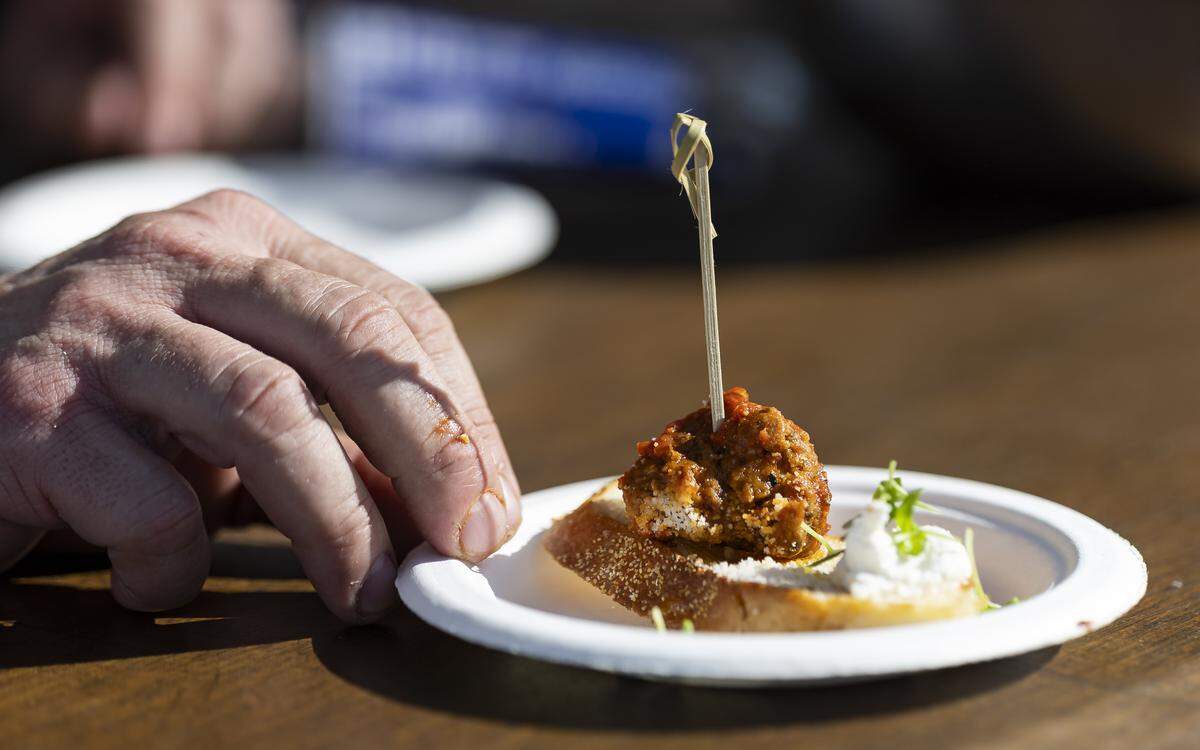 A meatball crostini by Bar Luca is prepared for guests attending the Goya Foods' Grand Tasting Village during the Food Network South Beach Wine & Food Festival on Saturday, Feb. 21, 2026, in Miami Beach, Fla.