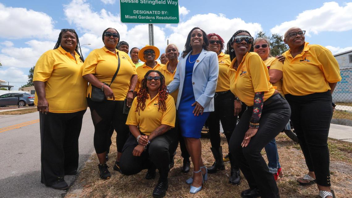 City of Miami Gardens Councilwoman Michelle Powell with members of Sunshine D.I.M.E lady motorcycle squad at the newly unveiled street sign honoring famous motorcyclist Bessie Stringfield at NW 24th Avenue and NW 153rd Terrace in Miami Gardens, Florida, Wednesday, April 30, 2025.