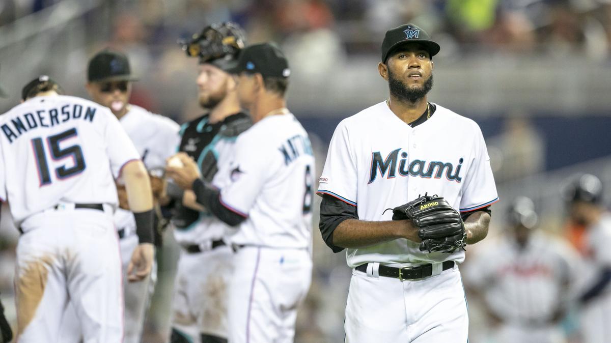 Miami Marlins relief pitcher Tayron Guerrero (56) leaves the mound after being replaced by Austin Brice (37) during the seventh inning of a game against the Atlanta Braves at Marlins Park in Miami, Florida, on Sunday, June 9, 2019.