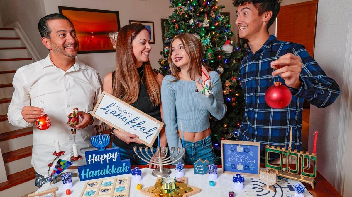 Frank Robleto Jr. and Sarah Robleto have different religious backgrounds (Frank is Catholic and Sarah is Jewish) so they celebrate both Christmas and Hanukkah with their children, Madelyne Robleto, 13, and Jacob Robleto, 19, at their home in Cutler Bay.