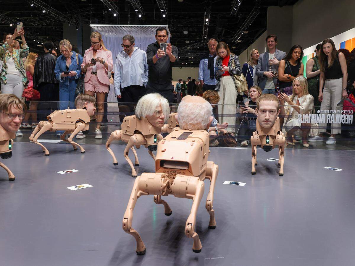 Fair goers scope are transfixed by the “Regular Animals” exhibit - part of Art Basel Miami Beach's inaugural AI sector, Zero 10 - was an instant hit at Wednesday's VIP opening at Art Basel Miami Beach on its opening day of the 23rd annual Art Basel in Miami Beach, Florida on Wednesday, December 3, 2025. The 23rd edition of Art Basel Miami Beach kicked off Wednesday as VIPs surveyed the collection of international and local galleries.