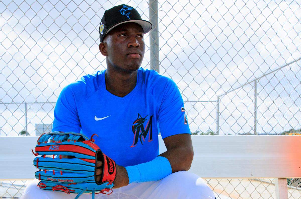 Miami Marlins outfielder Jesus Sanchez looks on during their spring training workout at Roger Dean Stadium on Wednesday, March 16, 2022 in Jupiter, FL.