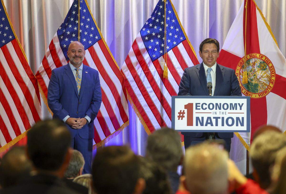 Gov. Ron DeSantis confirms Blaise&nbsp;Ingoglia, at left, as Florida’s Chief Financial Officer (CFO) during a press conference at the Grand Hyatt Tampa Bay on Wednesday, July 16, 2025, in Tampa.