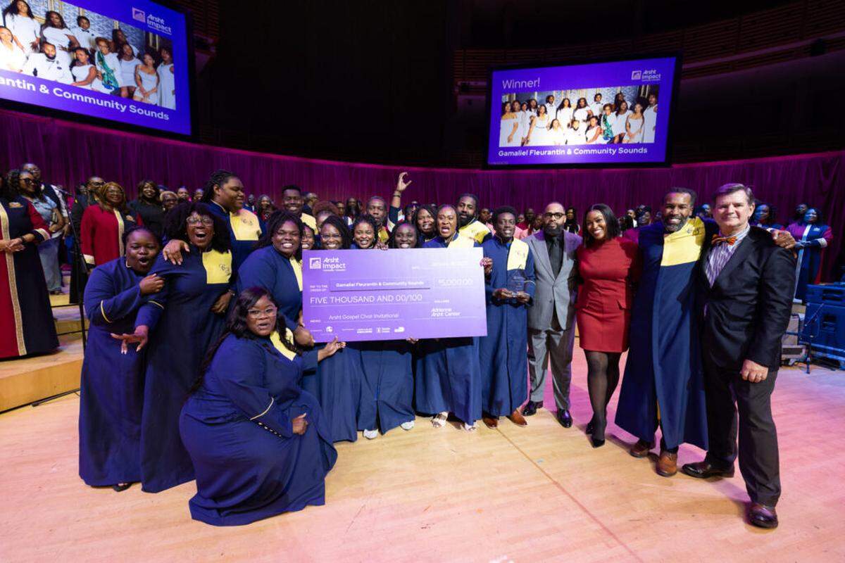 The winners of the 2025 Arsht Gospel Choir Invitational, Gamaliel Fleurantin & Community Sounds, with Arsht President and CEO Johann Zietsman, right.