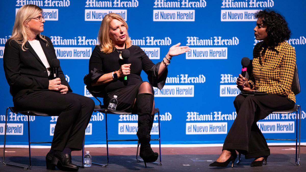 Miami Herald investigative reporter Julie K. Brown, center, and Miami Herald visual journalist Emily Michot, left, speak to moderator Nancy Ancrum, the Herald’s Editorial Page editor, at a 2019 town hall to discuss her ‘Perversion of Justice’ newspaper series.