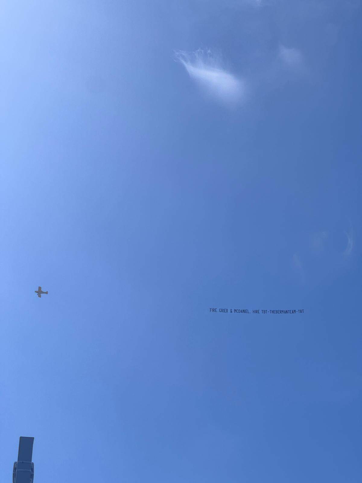 A banner calling for the firing of Miami Dolphins’ head coach Mike McDaniel and general manager Chris Grier was flown over Hard Rock Stadium once again on Sunday morning before the Miami Dolphins’ game against the Los Angeles Chargers.