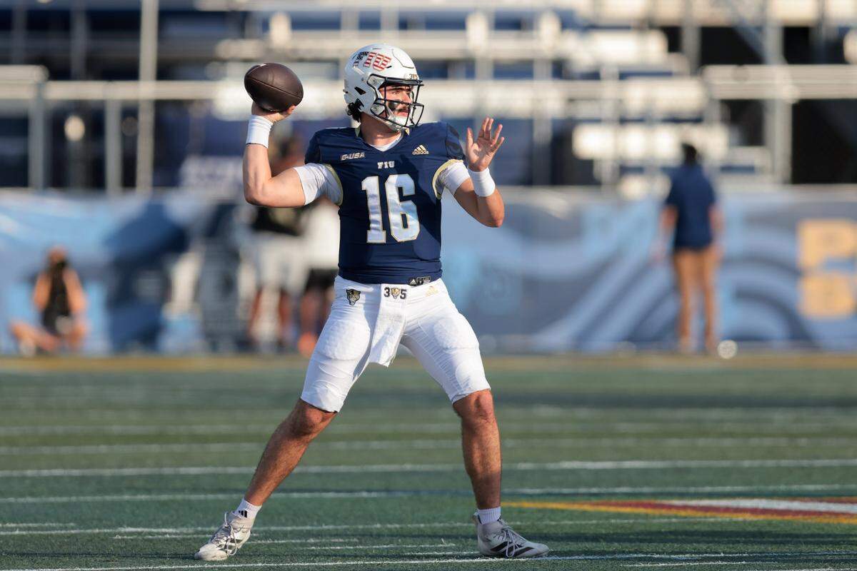 FIU Panthers quarterback Joe Pesansky (16) throws the football against the Jacksonville State Gamecocks during the first quarter at Pitbull Stadium on Saturday, Nov. 22, in Miami, Fla.