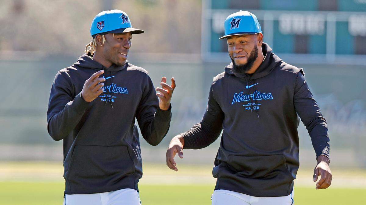 Miami Marlins Nick Gordon and Bryan De La Cruz, left to right, arrive for spring training at Roger Dean Chevrolet Stadium in Jupiter, Florida on Tuesday, February 20, 2024.