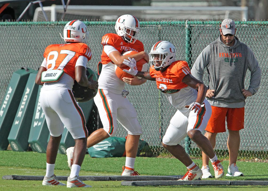 Miami Hurricanes tight end Brevin Jordan (9) running drills with teammates Michael Irvin II (87) and Larry Hodges (81) during practice at the University of Miami Greentree Practice Field in Coral Gables on Tuesday, September 10, 2019 in preparation for their home opener against The Bethune-Cookman Wildcats on Saturday at Hard Rock Stadium.