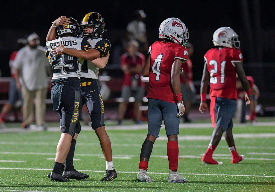 American Heritage kicker Julian Ramirez celebrates his game-winning field goal with teammate Alon Kochav after their game with Cardinal Gibbons, Friday, October 1, 2021.