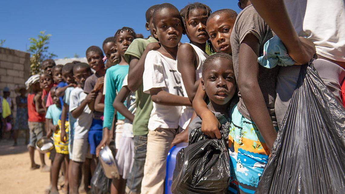 Children in Haiti line up for a hot meal in from World Central Kitchen, which has provided nearly 9 million meals over the past year in Haiti’s violence-torn Artibonite region. The global charity was founded in Haiti in the aftermath of the 2010 earthquake.