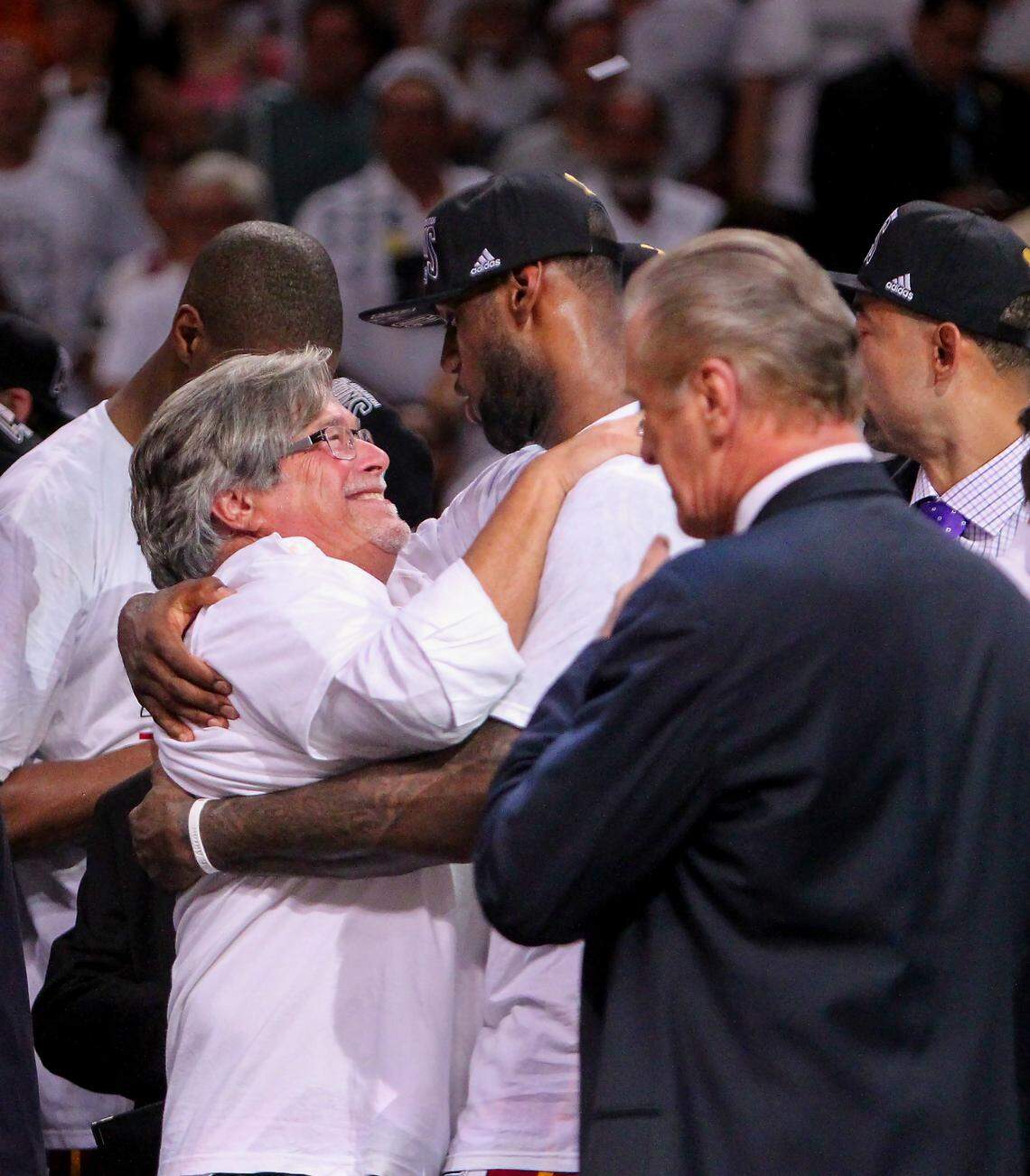Miami Heat owner Micky Arison, left with LeBron James,right celebrate after the Heat won Game 7 of the 2013 NBA Finals at AmericanAirlines Arena in Miami, Florida on Thursday, June 20, 2013.
