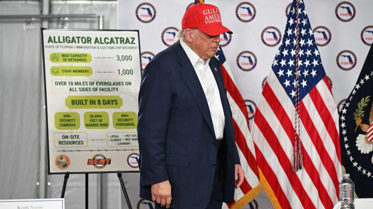 US President President Donald Trump arrives to attend a roundtable discussion as he visits a migrant detention center, dubbed “Alligator Alcatraz,” located at the site of the Dade-Collier Training and Transition Airport in Ochopee, Florida, on July 1, 2025. President Trump is visiting a migrant detention center in a reptile-infested Florida swamp dubbed “Alligator Alcatraz.” Trump will attend the opening of the 5,000-bed facility -- located at an abandoned airfield in the Everglades wetlands -- part of his expansion of deportations of undocumented migrants, his spokeswoman said. (Photo by ANDREW CABALLERO-REYNOLDS / AFP) (Photo by ANDREW CABALLERO-REYNOLDS/AFP via Getty Images)          