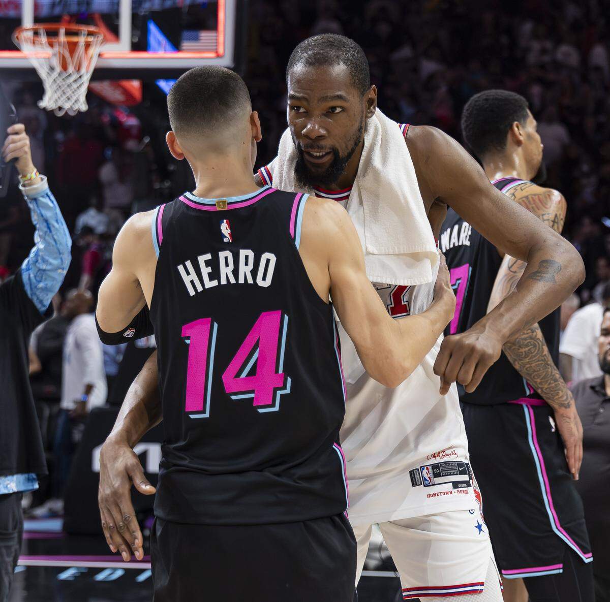 Miami Heat guard Tyler Herro (14) greets Houston Rockets forward Kevin Durant (7) after their NBA game at the Kaseya Center on Saturday, Feb. 28, 2026, in downtown Miami, Fla. The Miami Heat defeated the Houston Rockets.