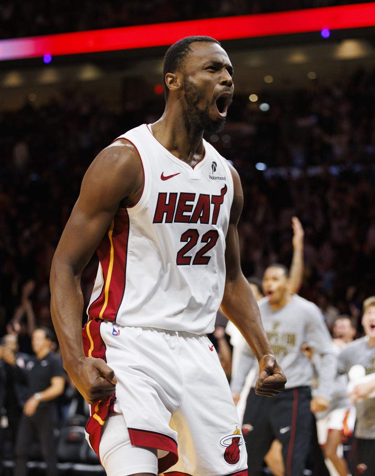 Miami Heat forward Andrew Wiggins (22) cheers after scoring the winning basket during overtime of a game against the Cleveland Cavaliers on Monday, Nov. 10, 2025, at the Kaseya Center in downtown Miami, Fla.