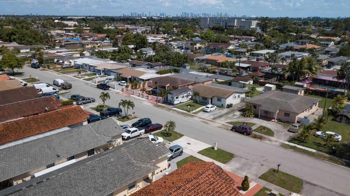 A Hialeah neighborhood with the skyline of the City of Miami in the background.