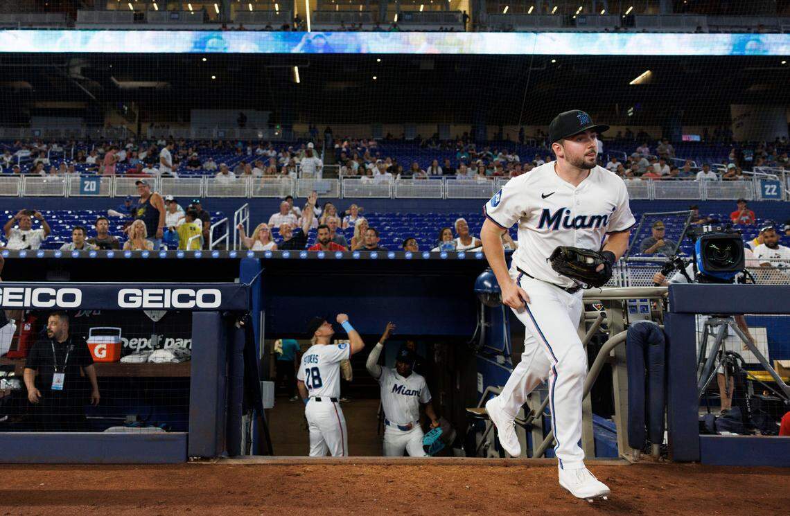 Miami Marlins first baseman Liam Hicks (34) runs onto the field before the first inning of a game against the San Diego Padres on Monday, July 21, 2025 at loanDepot Park in Miami, Fla. 