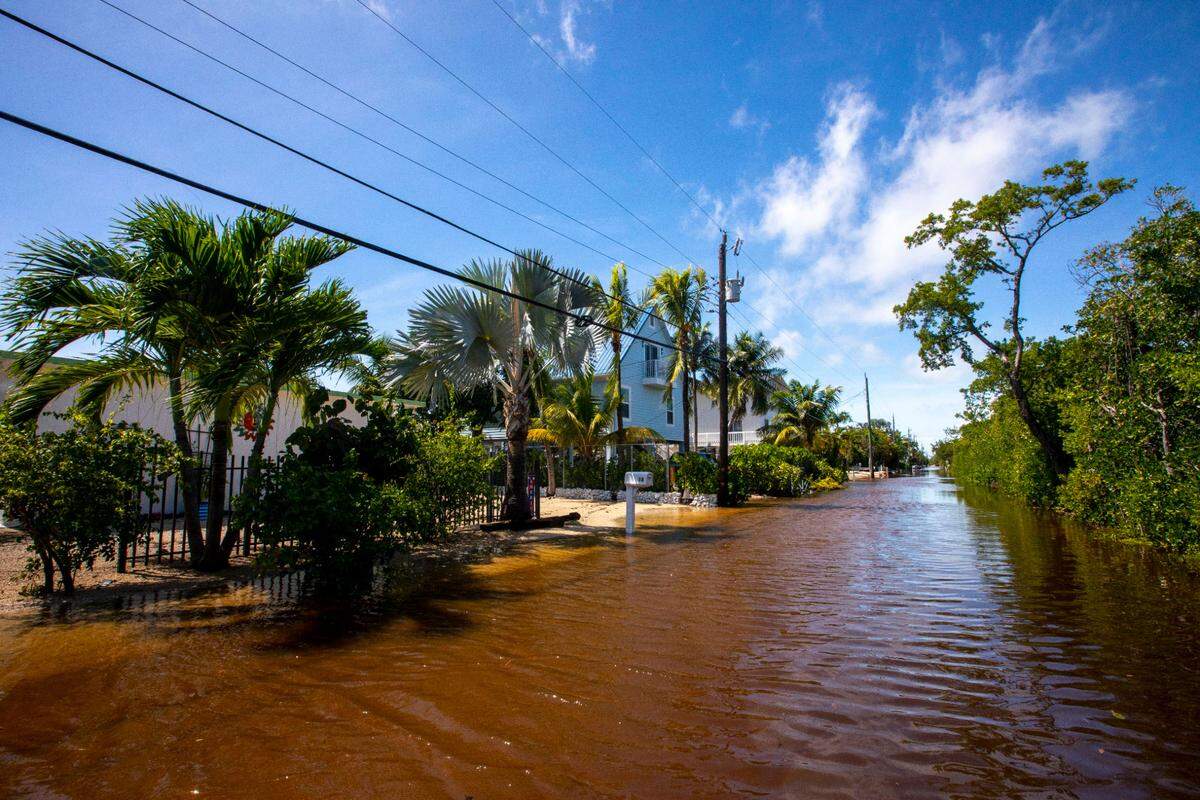 A view down North Blackwater Lane during flooding due to Hurricane Ian at Stillwright Point in Key Largo, Florida, on Thursday, September 29, 2022.