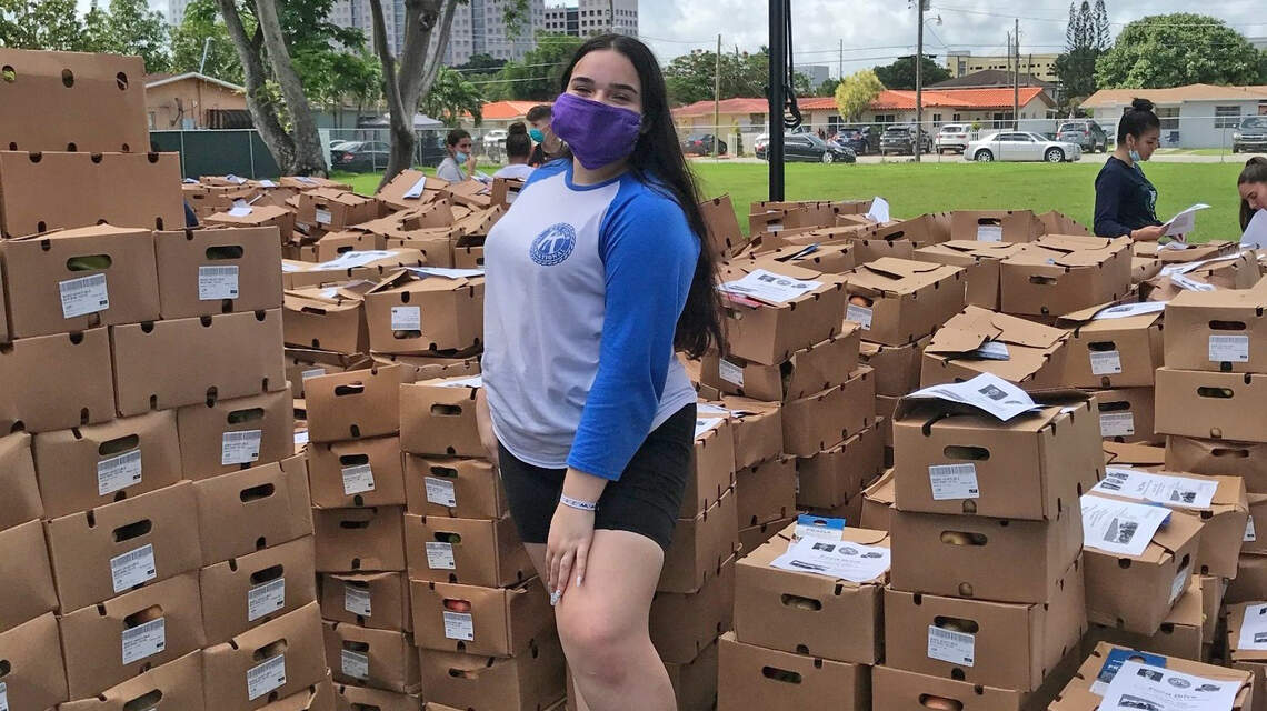 She’s 15 years old and her goal is to feed 100,000 needy families in South Florida