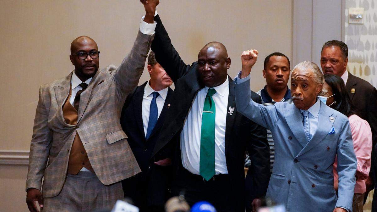 Philonise Floyd, Attorney Ben Crump and the Rev, Al Sharpton, from left, react after a guilty verdict was announced at the trial of former Minneapolis police Officer Derek Chauvin for the 2020 death of George Floyd, Tuesday, April 20, 2021, in Minneapolis, Minn. Former Minneapolis police Officer Derek Chauvin has been convicted of murder and manslaughter in the death of Floyd. (AP Photo/Julio Cortez)