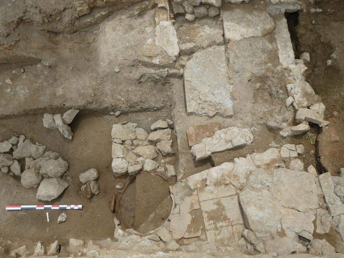 A round jar (bottom center) would have collected rainwater and then dripped it into the bath system, researchers said.