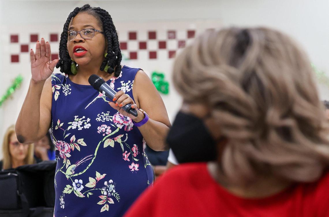 Activist Mae Smith, left, gives her remarks against the closure of Broward Estates Elementary. The school district organized a meeting at the school Monday, March 3, for community members to discuss plans to repurpose the school into an early learning center. Several residents spoke out against the school closure.