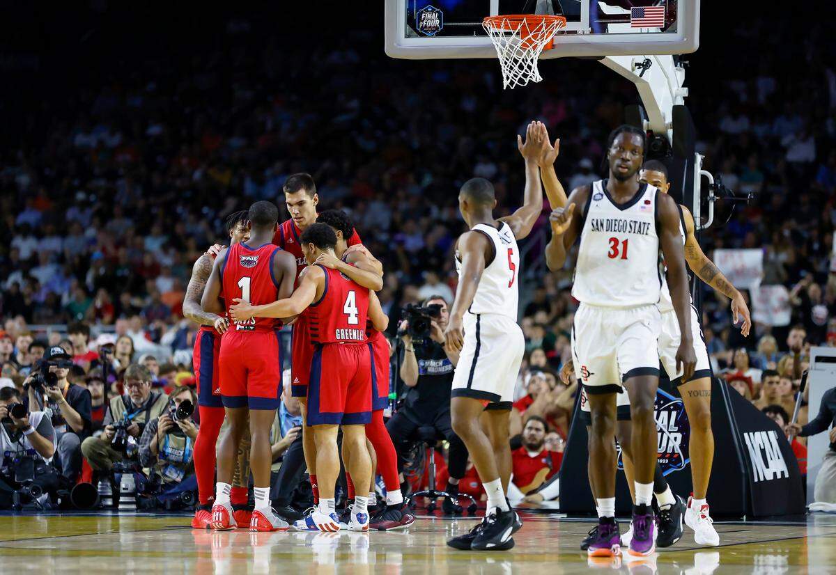 San Diego State Aztecs guard Matt Bradley (20) defends Florida Atlantic Owls guard Nicholas Boyd (2) during the first half of the Men’s Basketball Championship National Semifinal at NRG Stadium in Houston, Texas on Saturday, April 1, 2023.