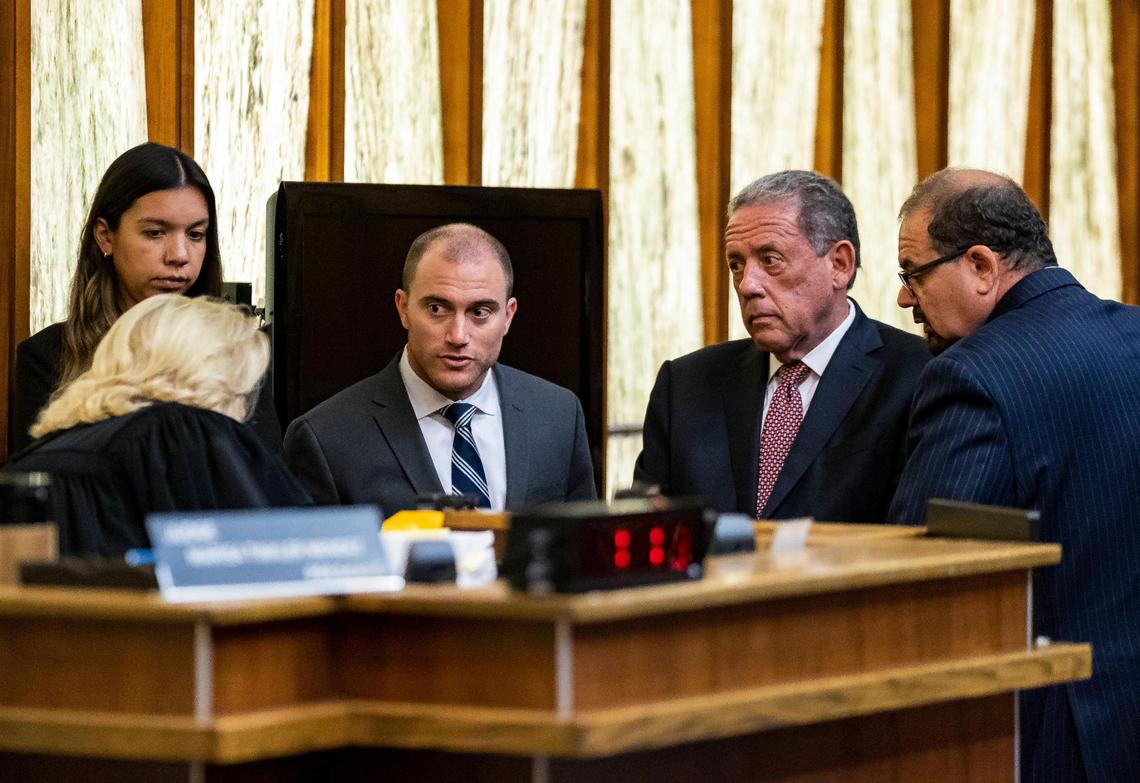Judge Marisa Tinkler Mendez, far-left, holds a sidebar with attorneys from the prosecution and defense during pre-trial motions on the second day of jury selection at the Miami-Dade Criminal Court on Wednesday, Sept. 21, 2022, in Miami, Fla. Mexican actor Pablo Lyle is accused of killing a motorist in a road-rage incident. From right to left: Defense attorneys Philip Reizenstein, Bruce Lehr and prosecutor Shawn Abuhoff.