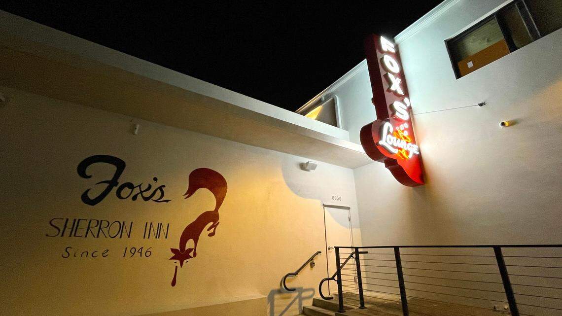 The original Fox’s Lounge neon sign and entrance have been moved to the back of the original building.