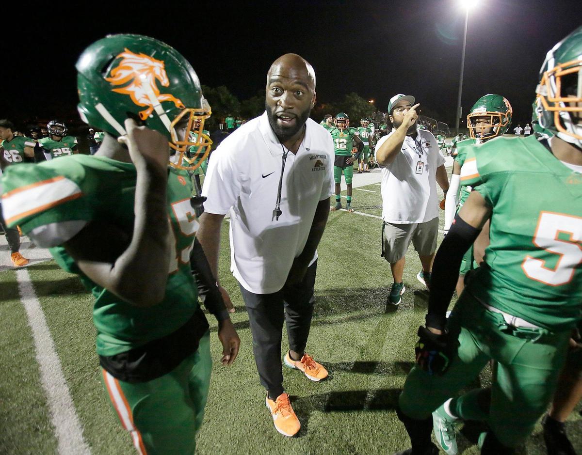 McArthur Mustangs head coach Kevin Burnett during football game against Dr. Michael M. Krop Lightning on Friday, October 28, 2022 at Ives Estate Park in Miami. Andrew Uloza / for Miami Herald