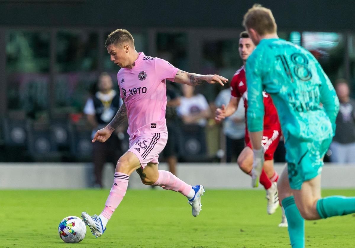 Inter Miami midfielder Robert Taylor (16) kicks a goal past New York Red Bulls goalkeeper Ryan Meara (18) during the second half of their MLS soccer match at DRV PNK Stadium on Sunday, May 22, 2022, in Fort Lauderdale, Florida.