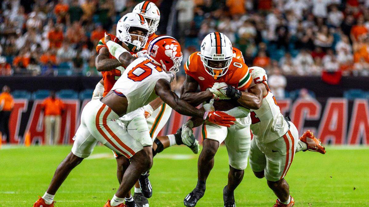University of Miami wide receiver Brashard Smith (0) runs the ball during the second quarter of an ACC college football game against Clemson University at Hard Rock Stadium in Miami Gardens, Florida, on Saturday, October 21, 2023.