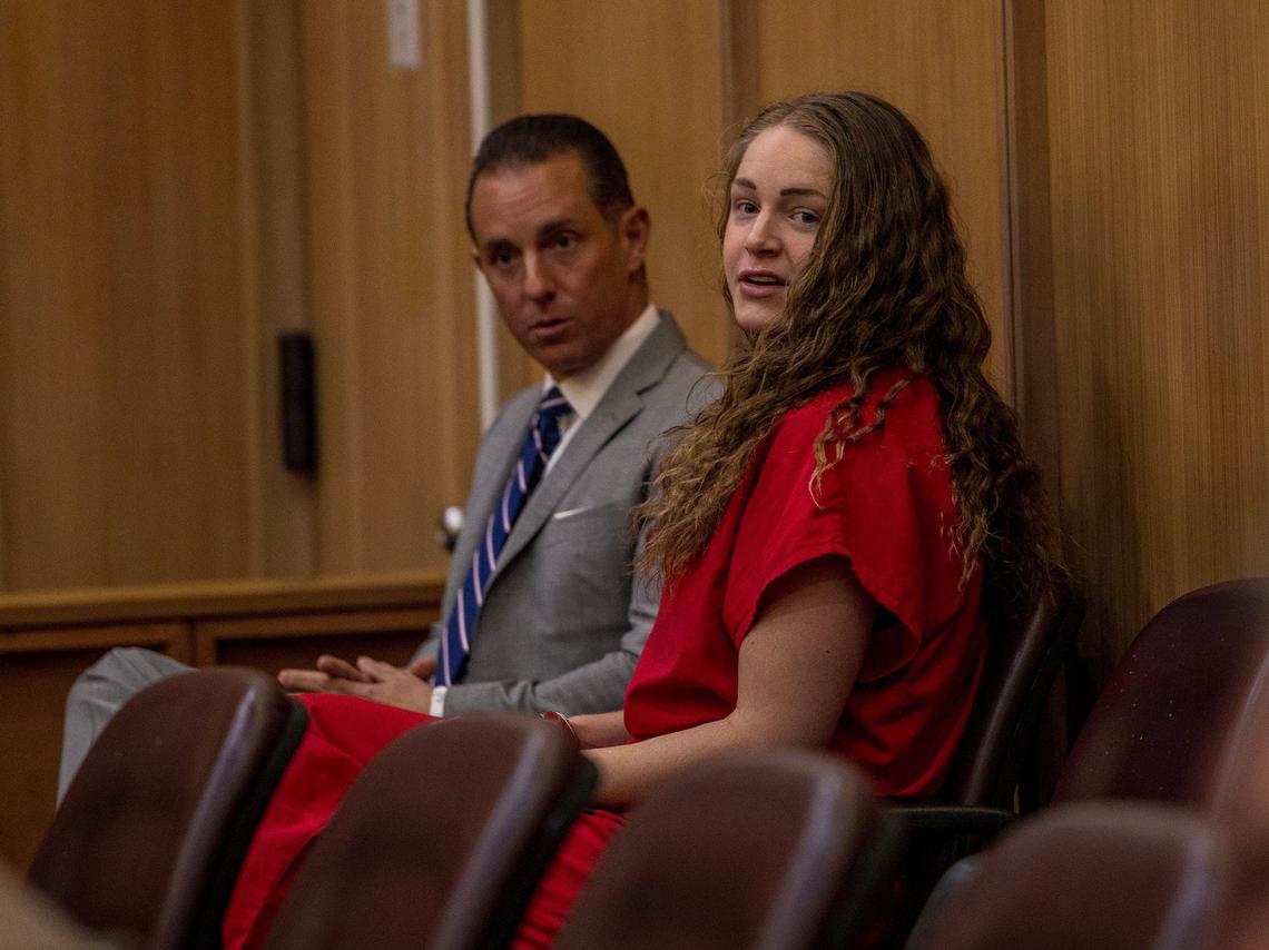Accused murderer and OnlyFans model Courtney Clenney in court Wednesday with attorney Jude M. Faccidomo, before a judge ruled evidence in a computer hacking case against her and her parents, would be tossed.