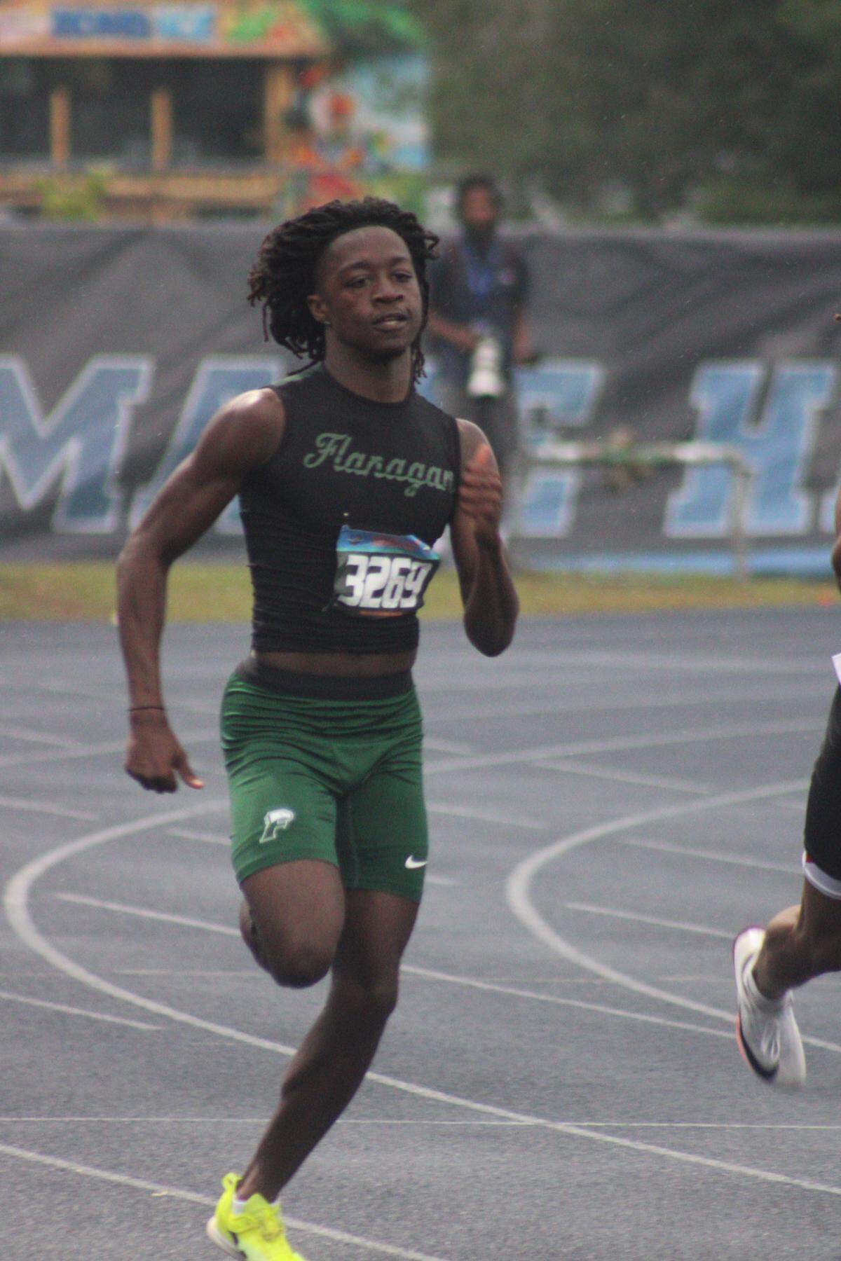 Flanagan senior Ronald Daniels competes in the 400-meter relay during Saturday’s Class 4A state championships at Hodges Stadium at UNF in Jacksonville, Fla.