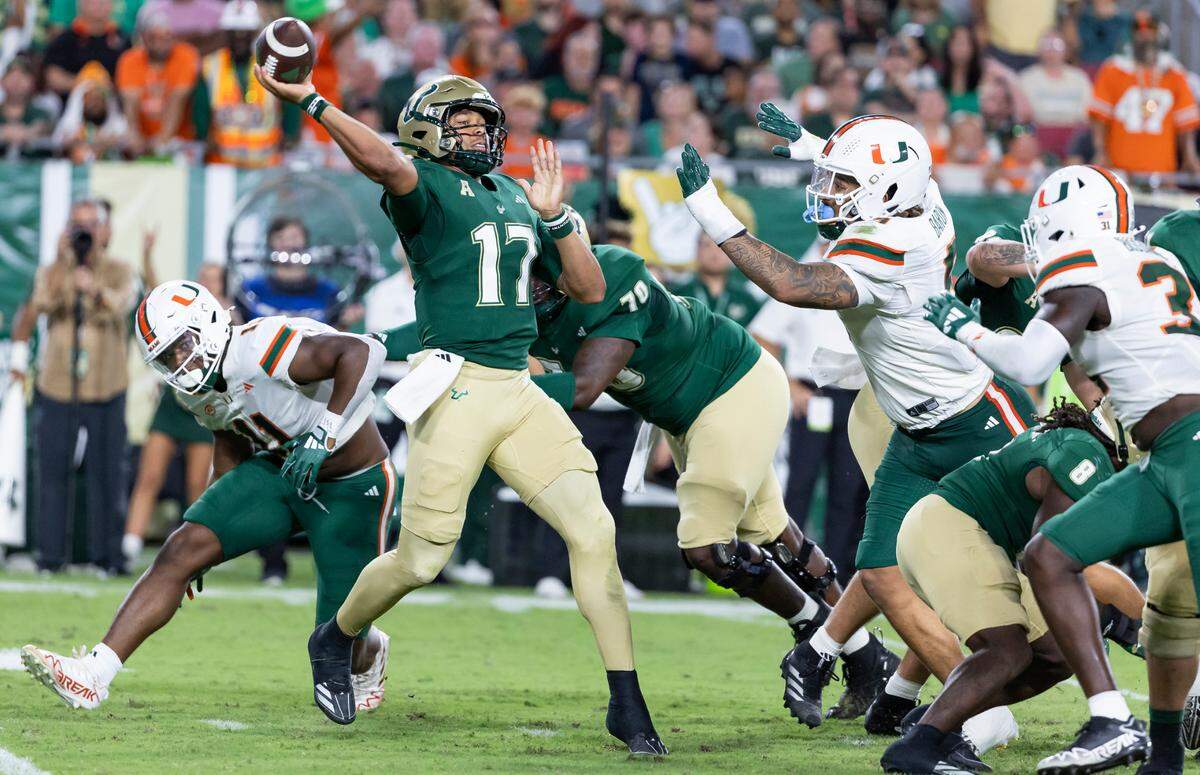 South Florida Bulls quarterback Byrum Brown (17) throws the ball in the first half of his NCAA college football game against the Miami Hurricanes at the Raymond James Stadium on Saturday, Sept. 21, 2024, in Tampa, Fla.