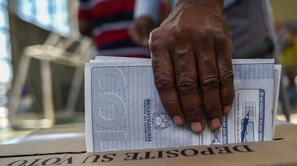 A man casts his vote at a polling station during parliamentary elections in Colombia in 2018, the first elections in which the FARC took part as a legal political party.