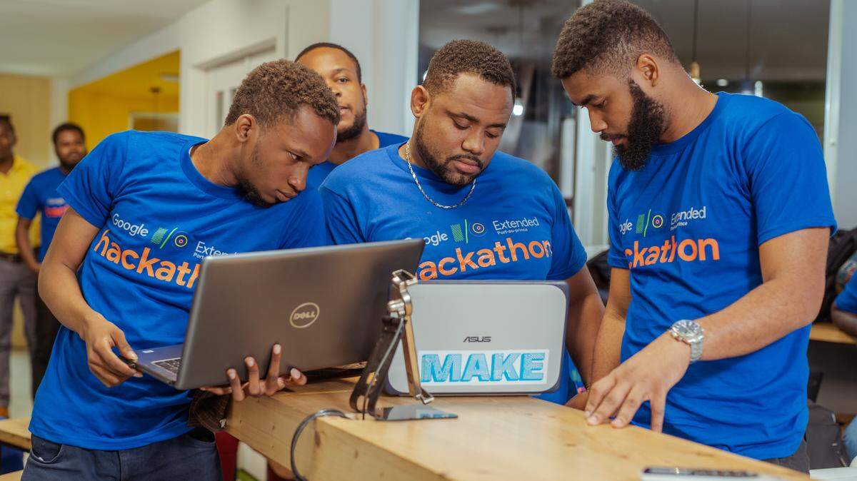 Local web coders in Haiti participate in a hackathon at Banj, a tech startup in Port-au-Prince, in April.