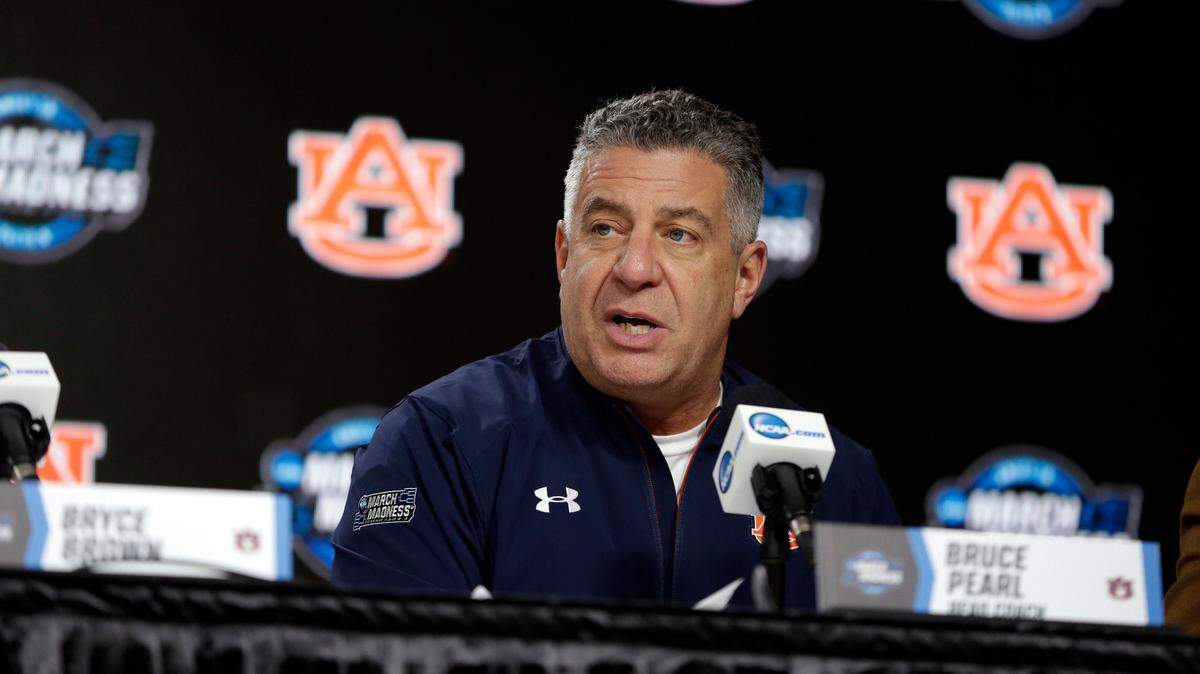 Auburn coach Bruce Pearl answers a question during a news conference Saturday.
